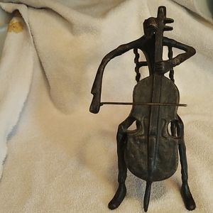 Metal cello player, made in India